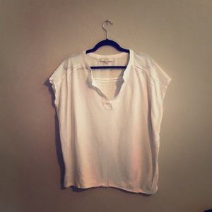 A white women’s Ann Taylor blouse
